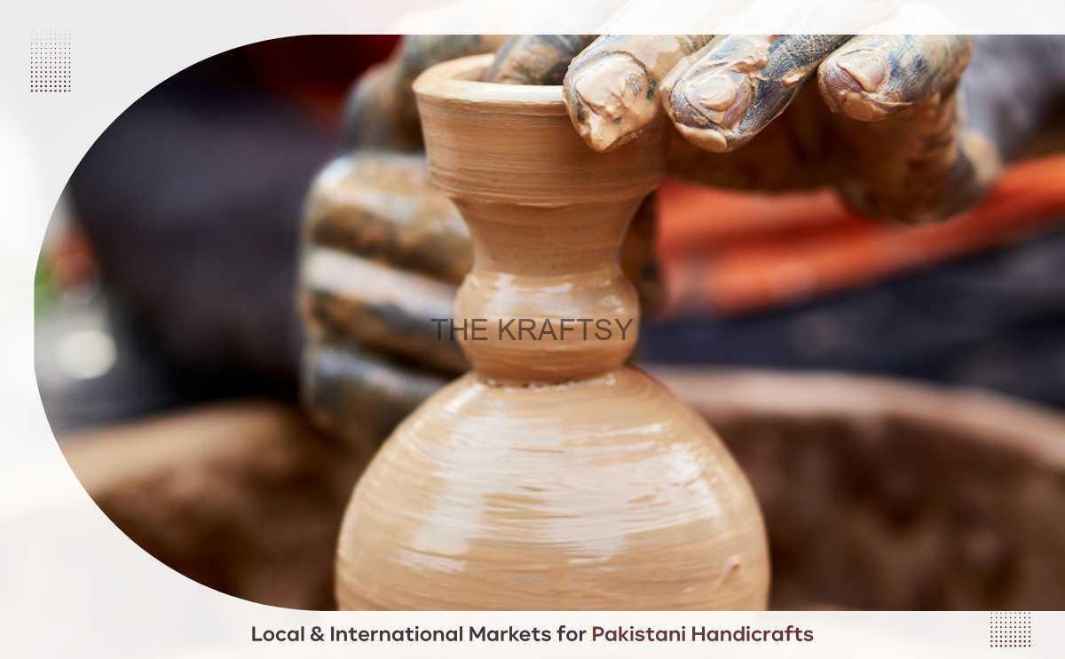 Hands shaping clay on a pottery wheel.